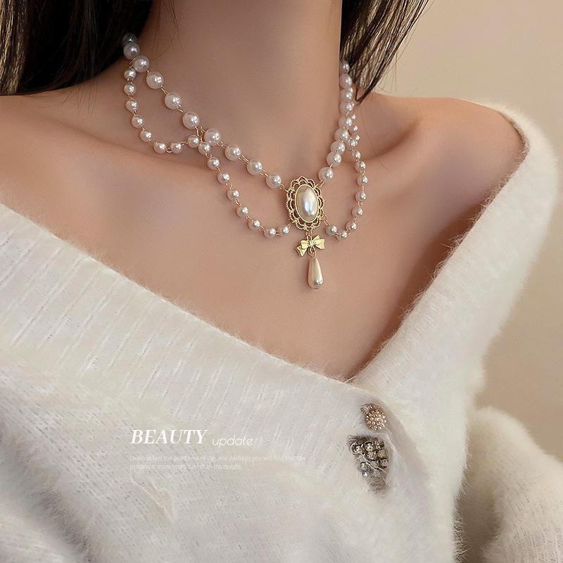 Collana a Clavicola con Nappa di Perle e Farfalla in Stile Coreano