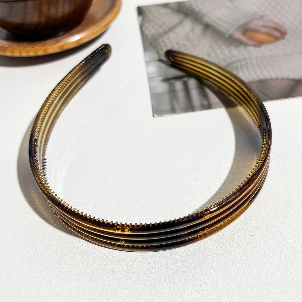 Korean retro striped glossy headband fashionable amber toothed non-slip headband PC advanced sense cranial top hairpin woman