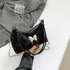 Gentle texture bow shoulder bag women's 2025 spring and summer niche design versatile ins messenger bag chain bag
