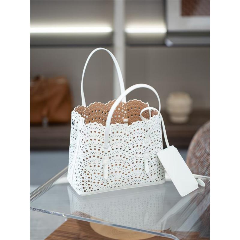 Niche sunflower wave hollow laser engraved cowhide vegetable basket genuine leather women's handbag single shoulder crossbody small bag holder