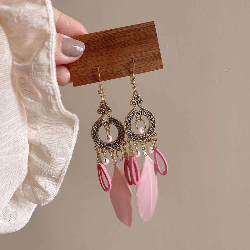 Retro Ethnic Bell Tassel Earrings: Exquisite, Fashionable Dangle Design with Light Luxury Appeal.