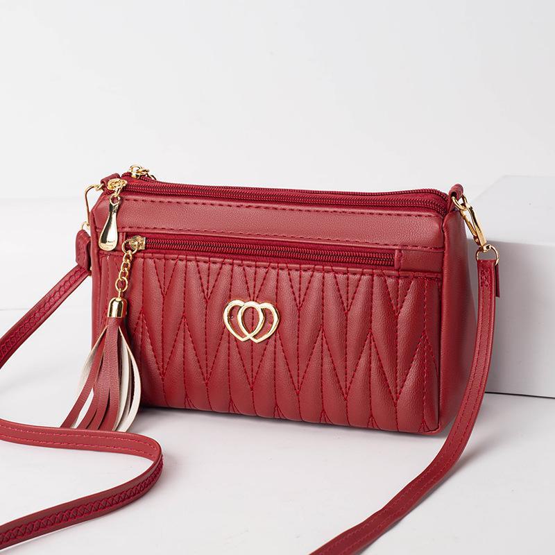 Women's Mini Messenger Bag: High-End Tassel Soft Leather for Middle-Aged Women