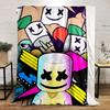 A colorful collage with smiling marshmallow faces and bold shapes. for all seasons blanket lunch break throw gift