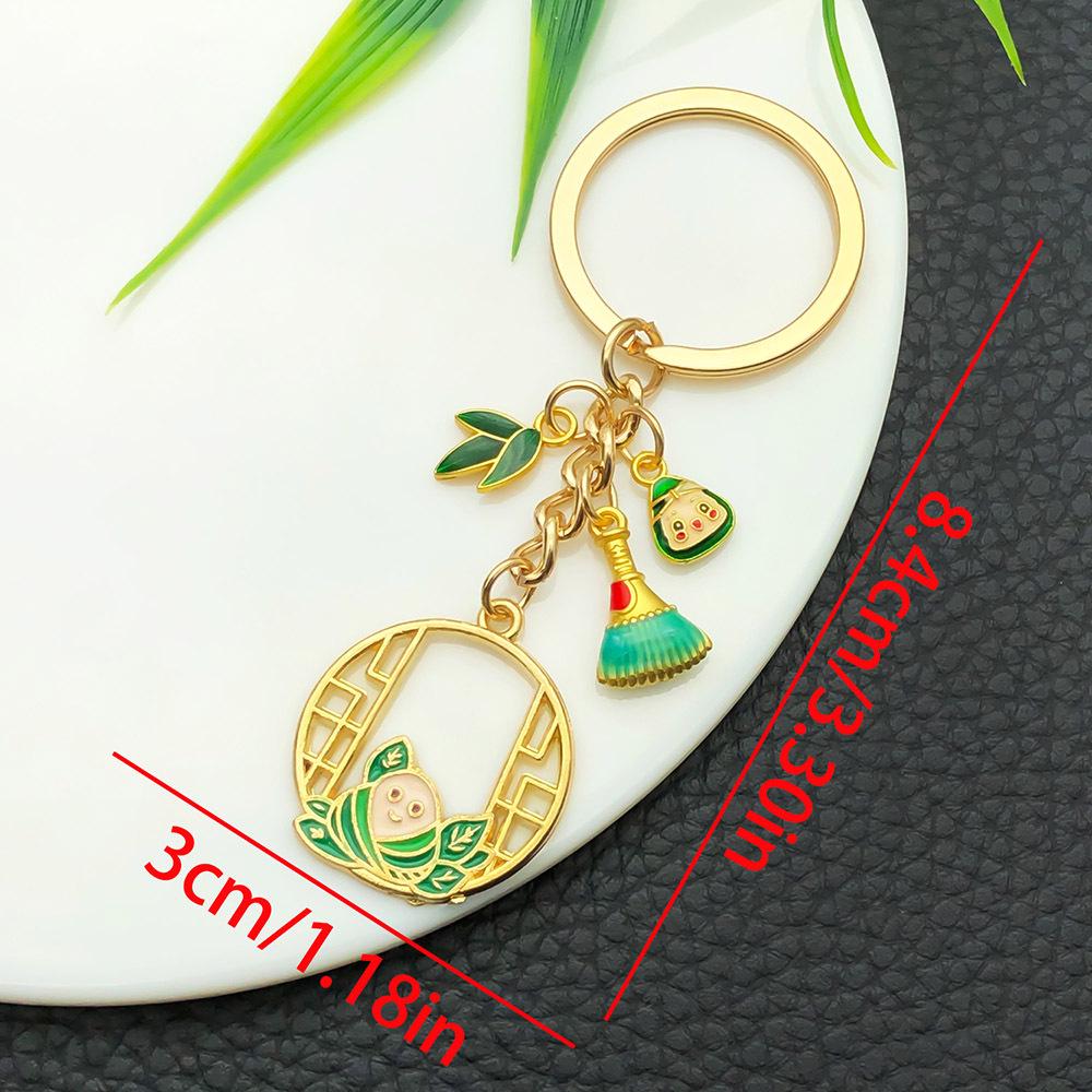 Dragon Boat Festival Zongzi Leaf Keychain Pendant with Smiling Face Design