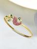 Pink & Green Cubic Zirconia Peacock Inspired Bangle Style Brass Kada For Women