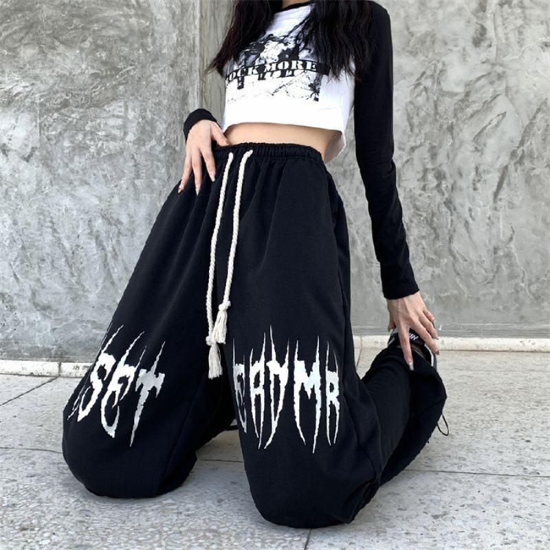 Nové podzimní dámské tepláky s vysokým pasem, stahovací šňůrkou, širokými nohavicemi a potiskem