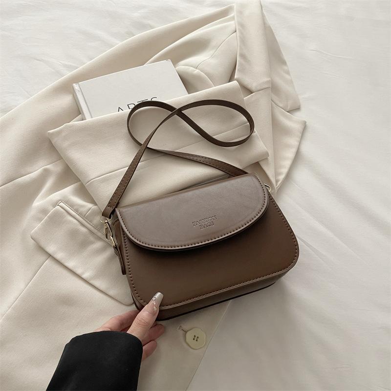 Strukturierte kleine Tasche Damen neue Mode schlichte Messenger kleine quadratische Tasche atmosphärisches Nischendesign Retro Umhängetasche