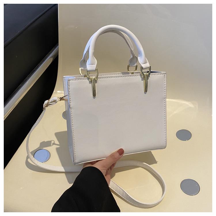 2024 Spring Women's Minimalist Crossbody Shoulder Bag - High-Quality, Fashionable, Versatile Handbag with Unique Stitching.