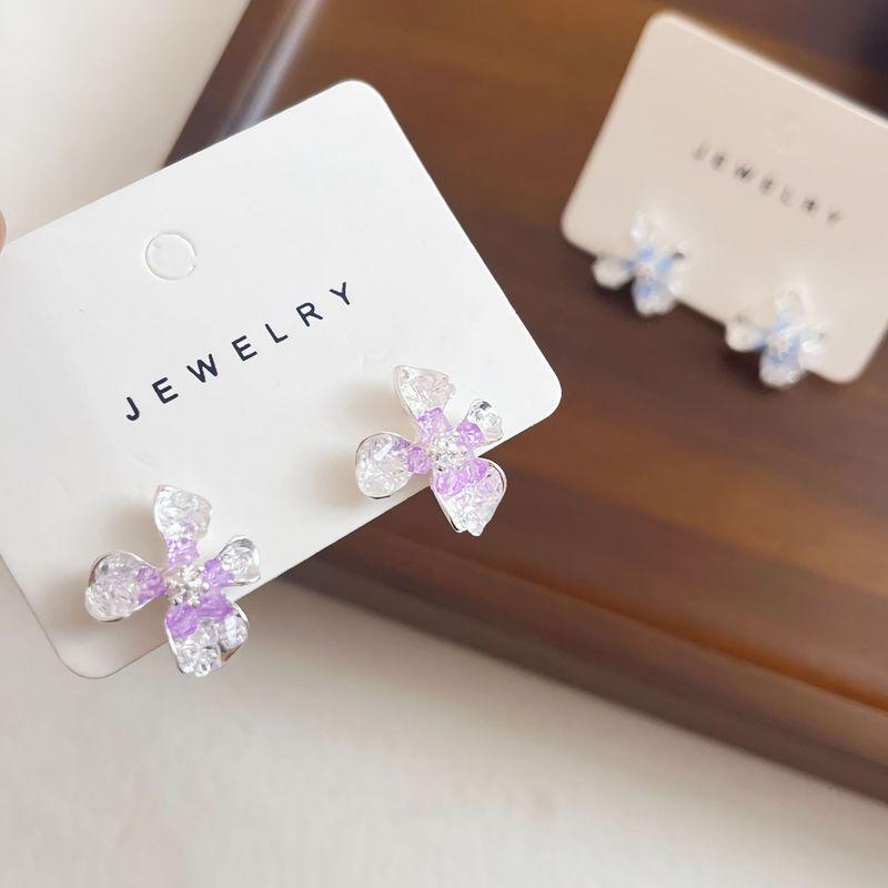 

Flower Element Earrings Rose Jasmine Camellia Female Tulip Earrings Temperamental Minority Classy Exquisite Earrings Purple four-petal flower
