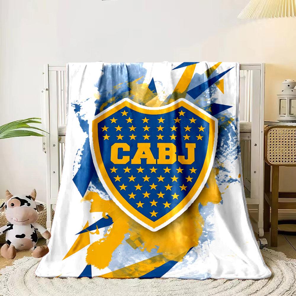 Blue and yellow shield with stars, splattered background, angular shapes. for all seasons blanket lunch break throw gift