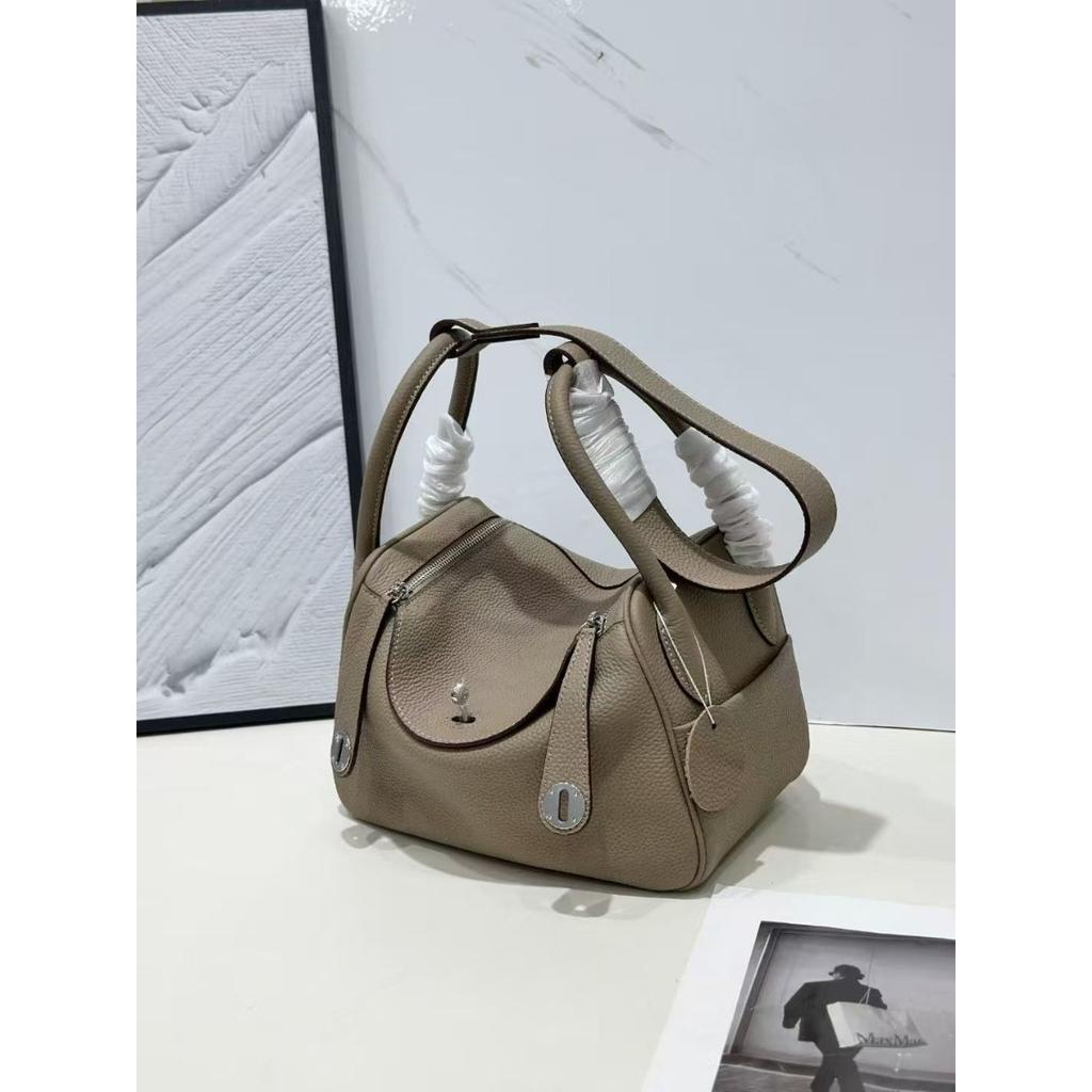 New leather pillow bag women's bag one-shoulder hand-held fashionable and versatile temperament mature woman bag