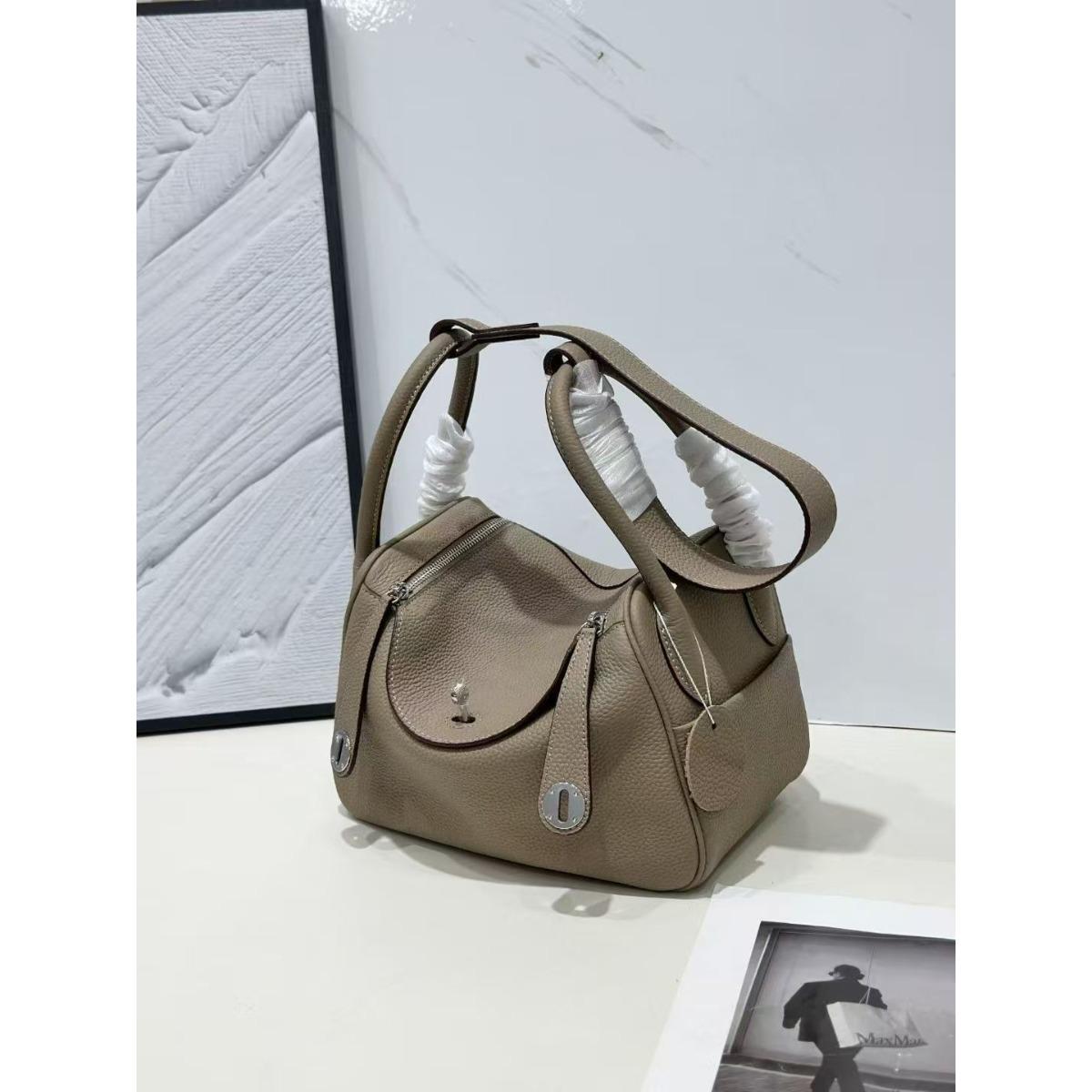 

New leather pillow bag women s bag one-shoulder hand-held fashionable and versatile temperament mature woman bag 20cm темно-сірий