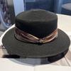 New spring and summer French elegant flat-top woven straw hat women's retro top hat sun protection seaside vacation beach sun hat