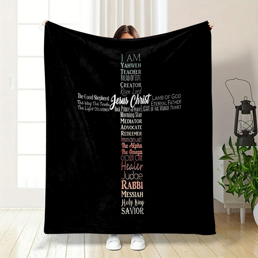 Text forms a cross, featuring titles and names associated with Jesus Christ. for all seasons blanket lunch break throw gift