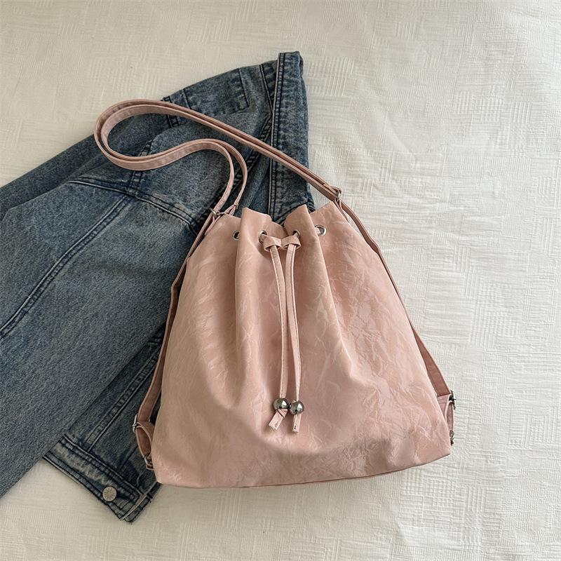 

Personalized texture small bag women s 2025 autumn new shoulder underarm bag bucket bag design commuter backpack розовый
