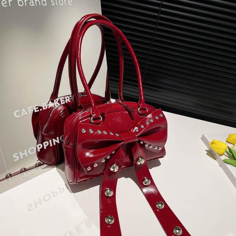 

Women s bag 2025 new rivet personalized locomotive armpit bag sweet cool babes cute bow shoulder bag tide чорний