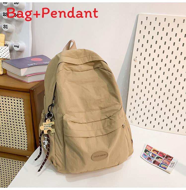 

Minimalist Solid Color Backpack For Women And Men With Durable Nylon Material Suitable For Casual Travel And School Use хакі
