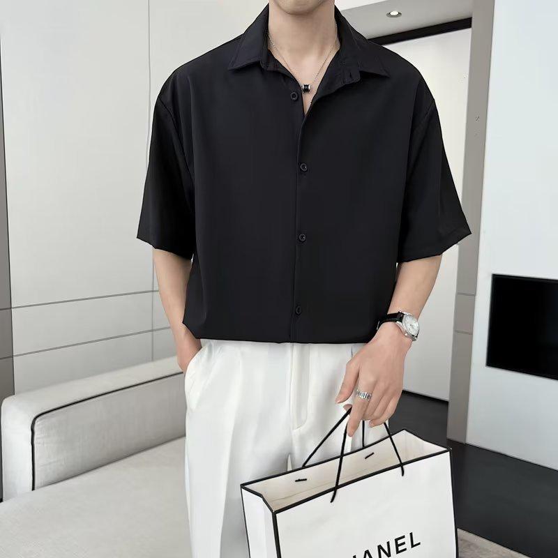 

Мужская классическая однотонная летняя рубашка с рукавами пять четвертей - Новый бизнес-тренд. Medium чёрный