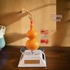 Solar-Powered Rotating Display Stand for Sun-Dried Gourd Treasures