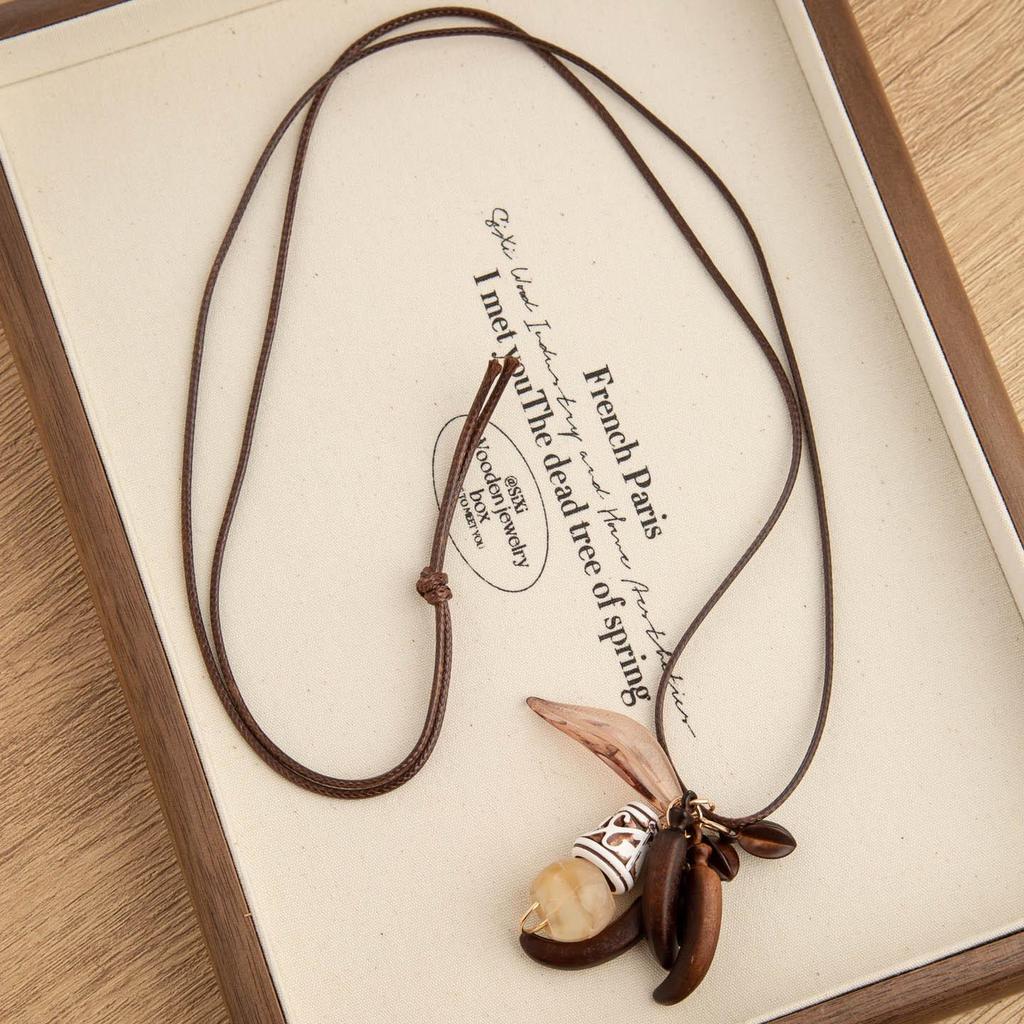 Chinese Floral Tassel Pendant Necklace - Ethnic Niche Design for Women, Versatile Long Sweater Chain Fashion Accessory