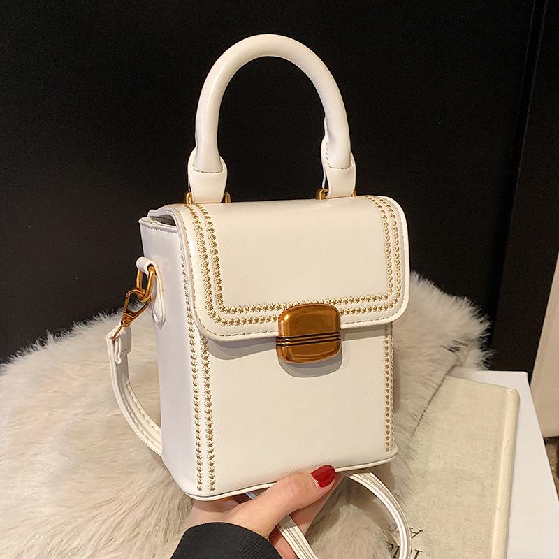 Today's fashion, retro, high-end portable box bag, simple temperament, versatile commuter messenger women's bag