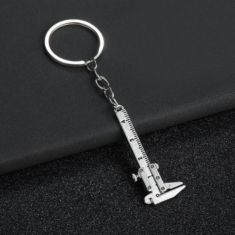 Přenosný Mini posuvné měřítko Klíčenka Mini kovové pravítko Klíčenka na klíče od auta Pohyblivý model posuvného měřítka Klíčenka Klíčenka Dárek