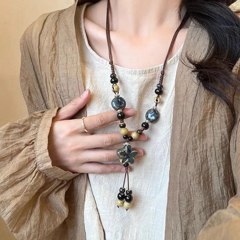 Bohemian Ethnic Style Long Bow Metal Necklace with Vintage Distressed Pendant (2025)