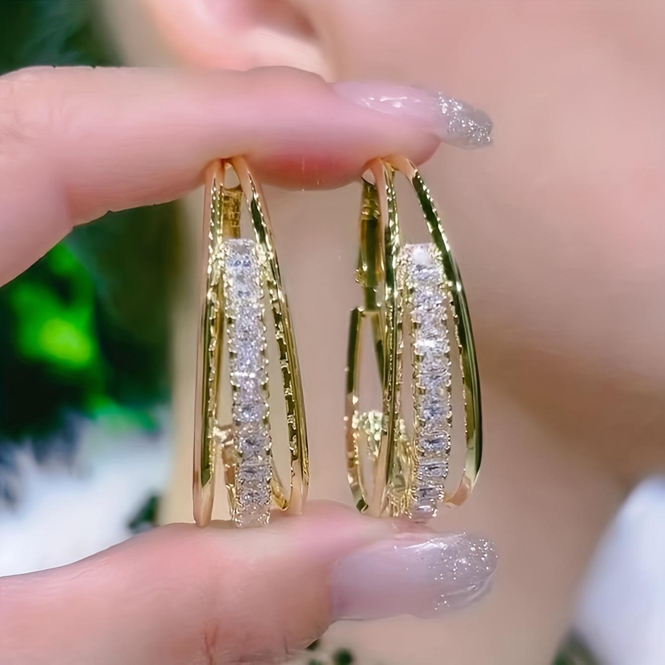 Exaggerated earrings, metal style, niche earrings, temperament, fashionable and versatile, high-end circle earrings.