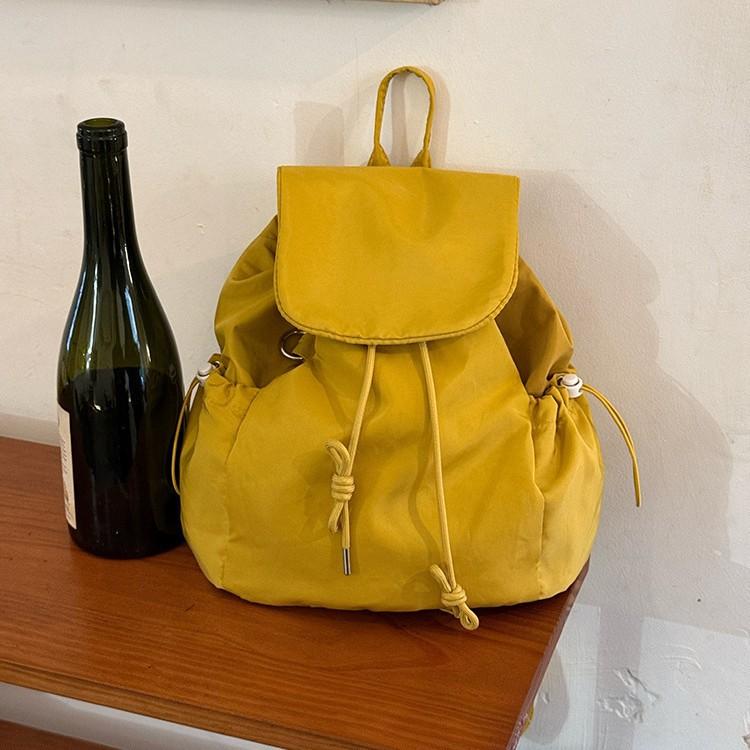 Korean street light nylon backpack bag women 2025 atmosphere plaid backpack casual commuter shoulder bag