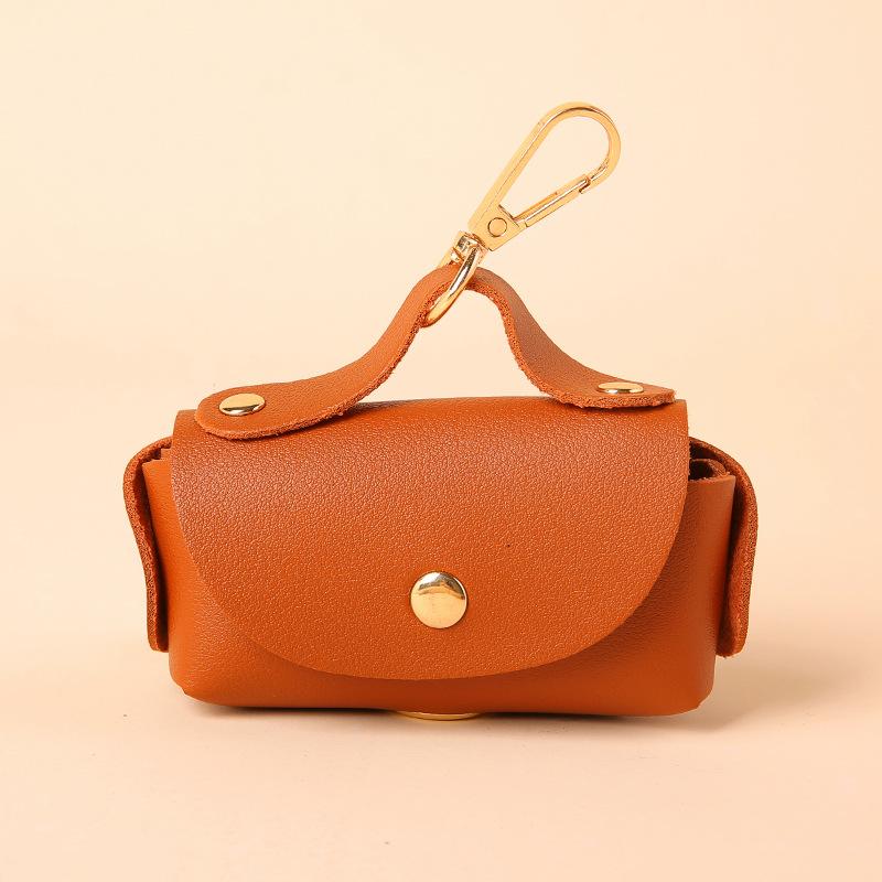 Elegant Leather Dog Poop Bag Carrier Clip Outdoor Walking and Travel Creative Pet Poop Waste Bag Dispenser