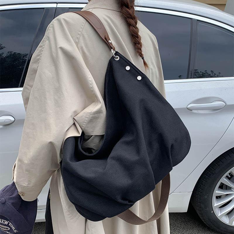 Casual commuting large-capacity canvas bag women's 2025 new lightweight and versatile messenger bag soft shoulder tote bag