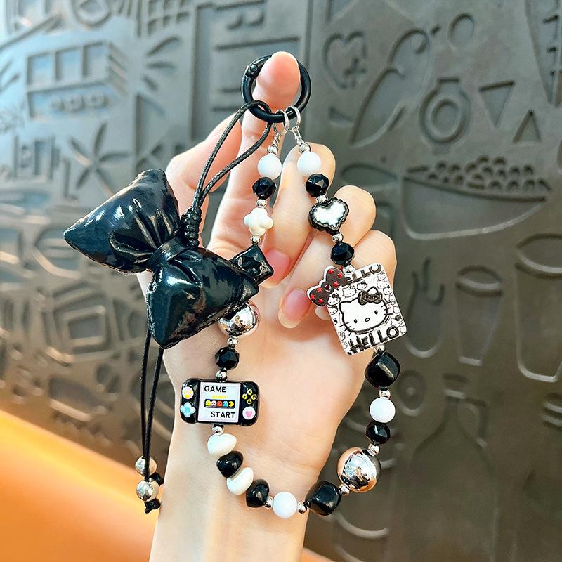 Creative new cat bow beaded mobile phone chain keychain exquisite cute bag pendant small gift wholesale