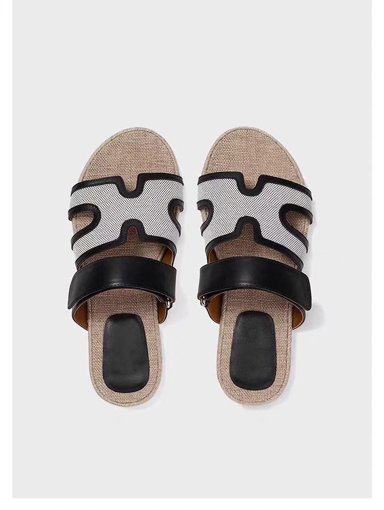 

Slippers women s 2025 new outer wear summer niche French fashion grass woven wind flat bottom beach sandals 35