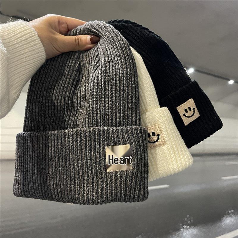 Autumn/Winter 2025 Smiley Face Woolen Knit Hat - Unisex, Warm, and Versatile Black with Ear Protection.