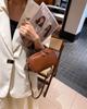 Mini handbagnew autumn/winter stylecrossbody baghand-heldfashionable cowhide leatherversatilegenuine leather retro women's bag.