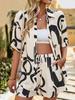 Black & White Geometric Two-Piece Set: Loose Short-Sleeve Shirt & Drawstring Shorts