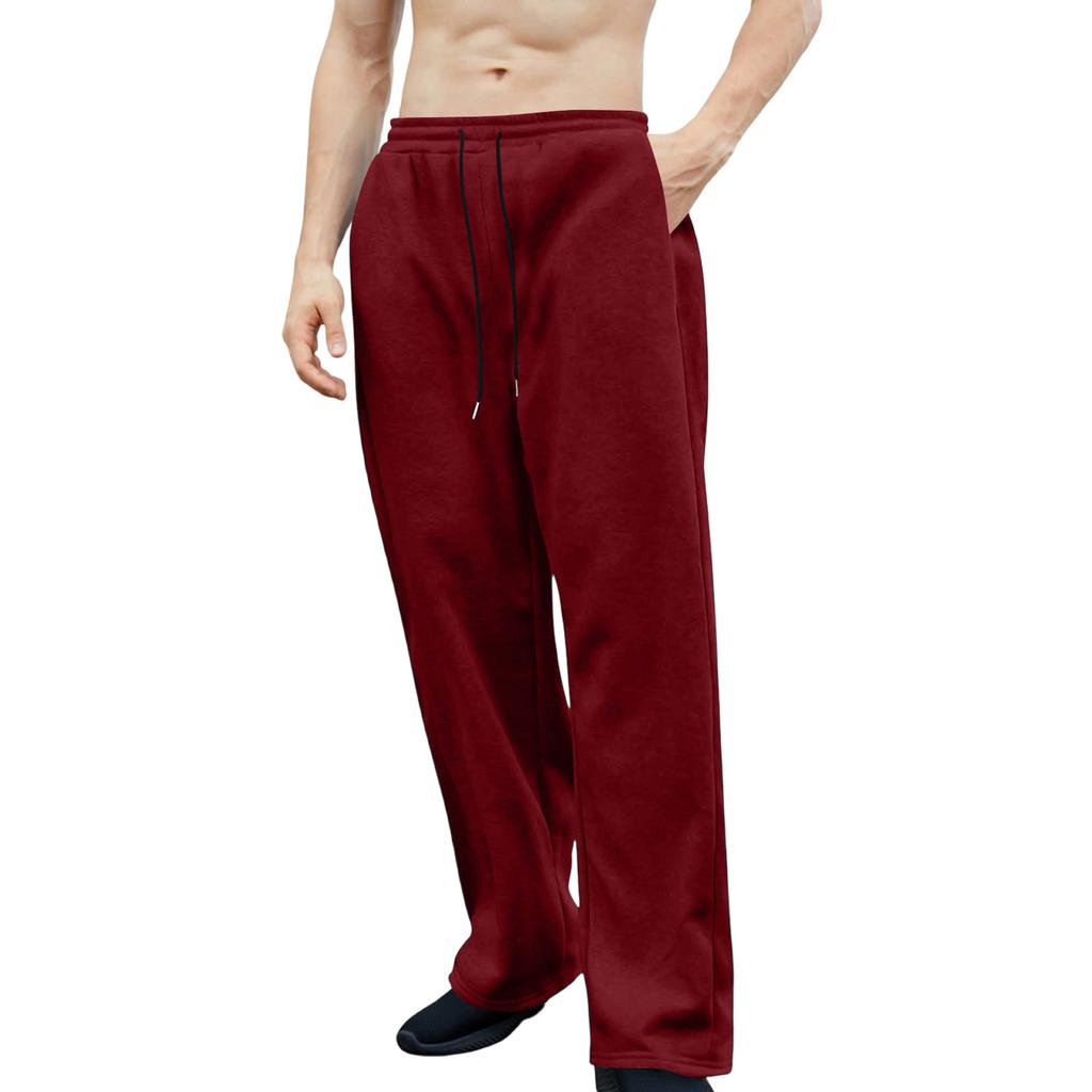 Pánské tepláky s elastickým pasem, rovný a široký střih, volný střih, s kapsami v pase.