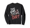This girl rides a dirt Trainer bike.