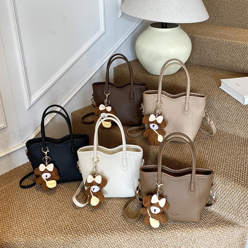 Premium Textur ausländischer Stil tragbare Bucket Bag Damen 2025 neu vielseitige Mode Gemüsekorb einzelne Schulter Messenger Damenhandtasche