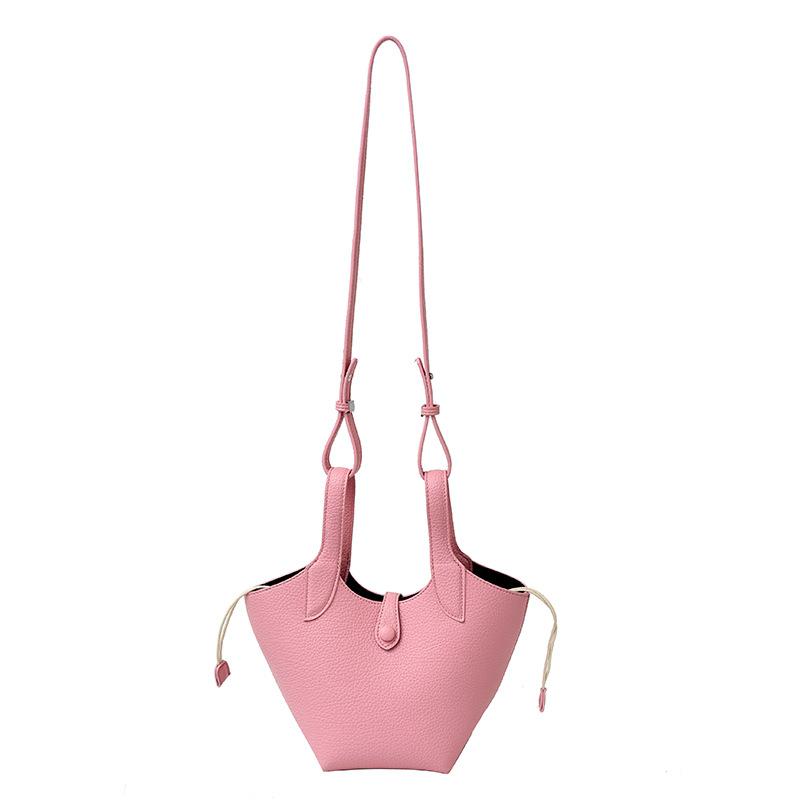 

2025 new simple solid color design hand carry vegetable basket bag women s foreign style commuting versatile casual messenger bag