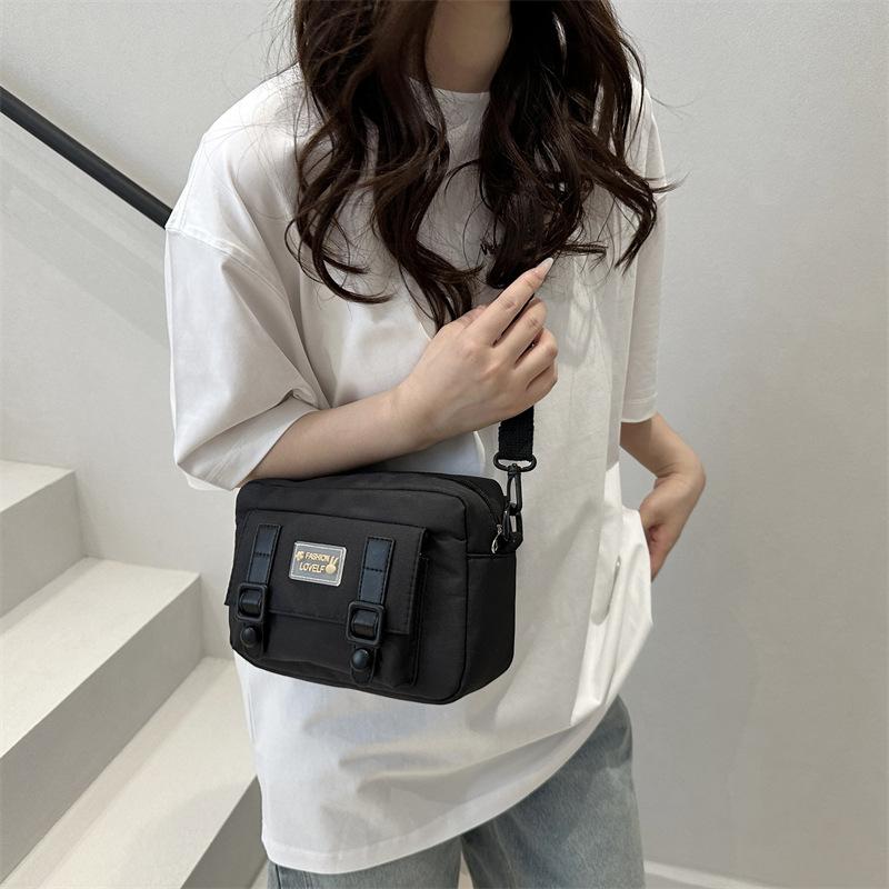 Cute canvas oblique span bag female niche vitality girl small fresh youth simple