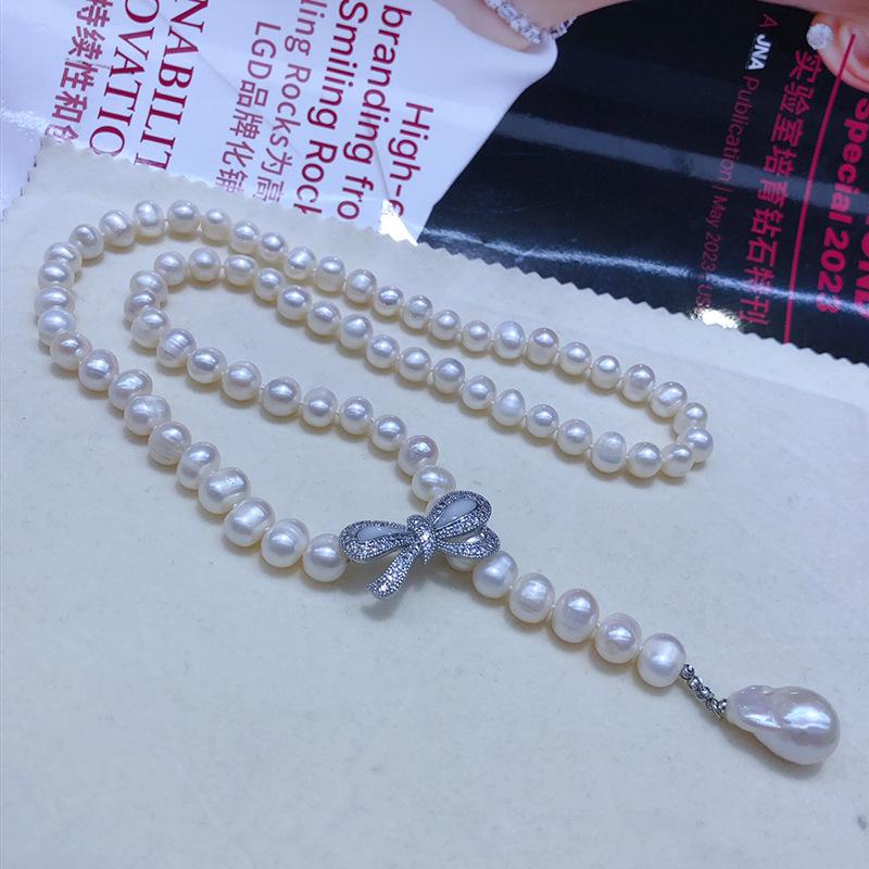 Elegant Bow-Style Freshwater Pearl Necklace - Near Round, Slightly Flawed, 60cm.
