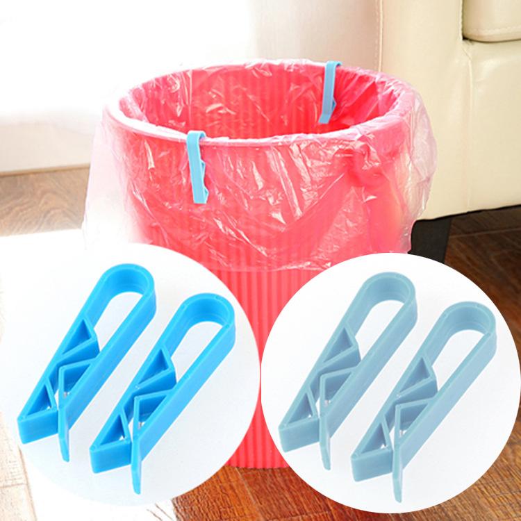 2 ks klipů na odpadkový koš v bonbónové barvě, klip na odpadky, klip na sáček do papírového koše, protiskluzový držák, boční klip na odpadkový koš.