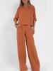 Women's Casual Cotton-Linen Two-Piece: Pocket Trousers & Short-Sleeve Pullover Top for Spring/Summer.