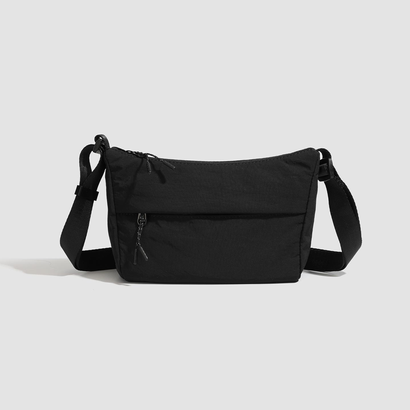 2026 new solid color simple shoulder messenger men s and women s bags trendy, lightweight and versatile Japanese leisure sports style small bags
