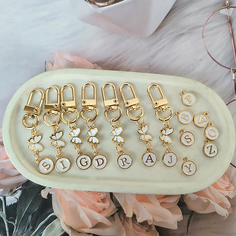 1 Stück Schlüssel-Logo Leichter Schlüsselanhänger Autoschlüssel Begleiter Taschenanhänger Langlebigkeit Metallschlüsselanhänger Monogramm-Anhänger Schmetterling Monogramm-Schlüsselanhänger