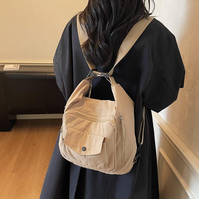 Casual backpack women's new versatile large-capacity women's high-end shoulder bag messenger bag