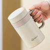 A women's solid color simple large caliber insulated cup, winter large capacity water cup, tea separation cup with handle