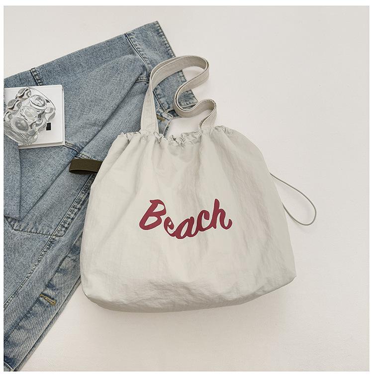 Spring and summer new fashionable large-capacity shoulder underarm bag female simple commuter student tote bag