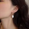 New Retro, Rare, and Dazzling Two-tone Fishtail-style Natural Baroque Pearl Earrings for Women, Featuring a Unique and Elegant French Design